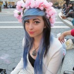 Black & blue haired girl with crown of pink flowers