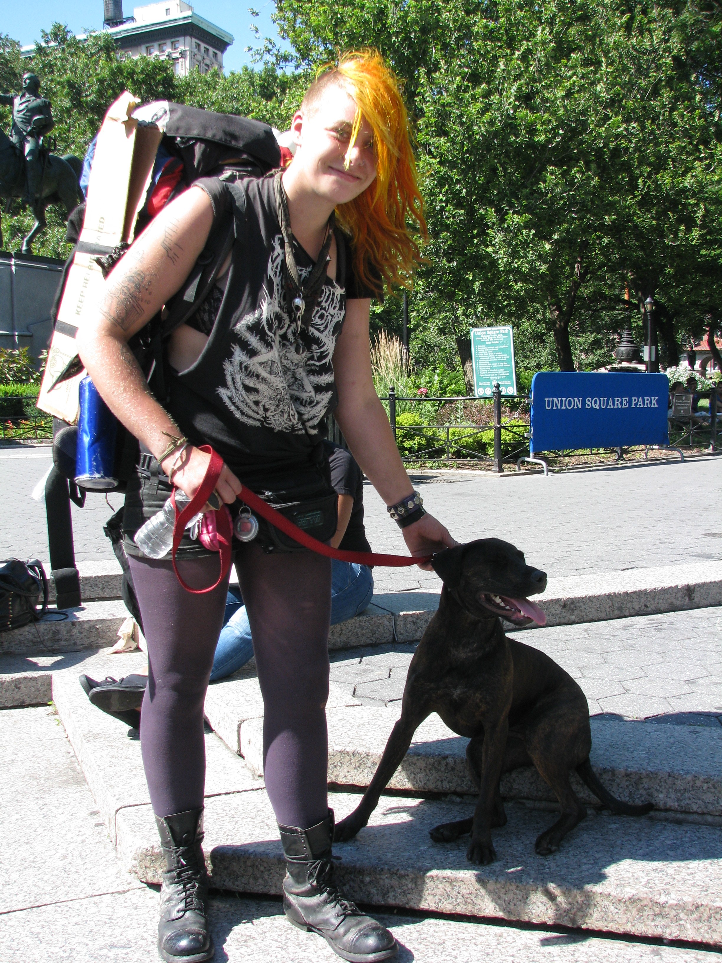 Crusty punk girl with dog