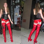 Woman in red vinyl boots & hot pants