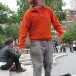 guy wearing orange hat & coat