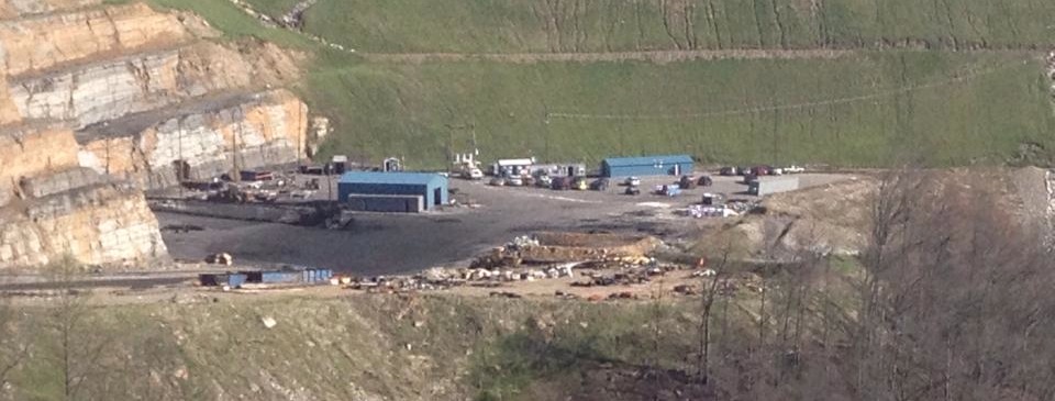 The outside of the Oceana, West Virginia mine I work in. You can barely see the drift mouth, to the left of the middle blue building