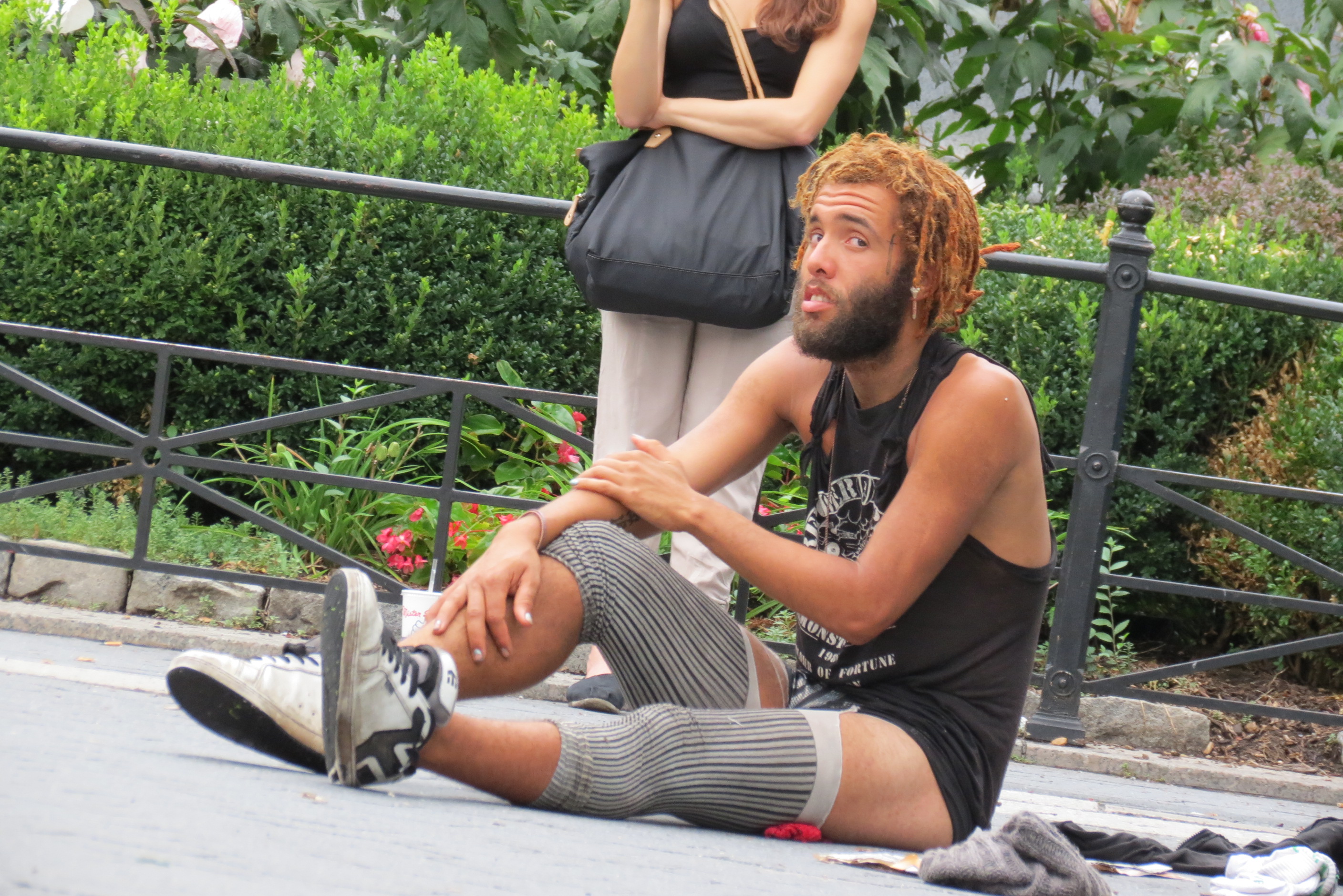 Homeless man wearing legwarmers