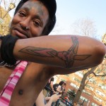 Black weird man with tattoos