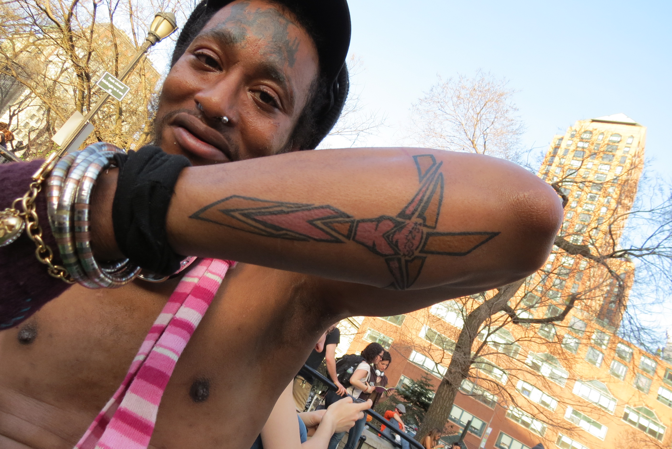 Black weird man with tattoos