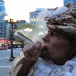 Homeless man Wendell smoking dollar bill