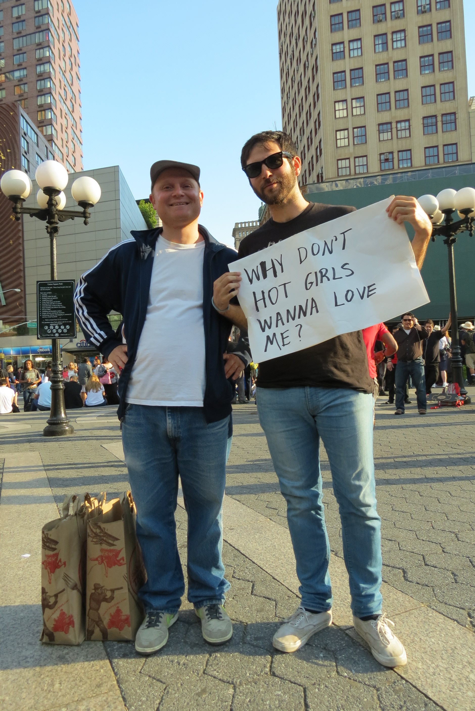 Men with funny sign