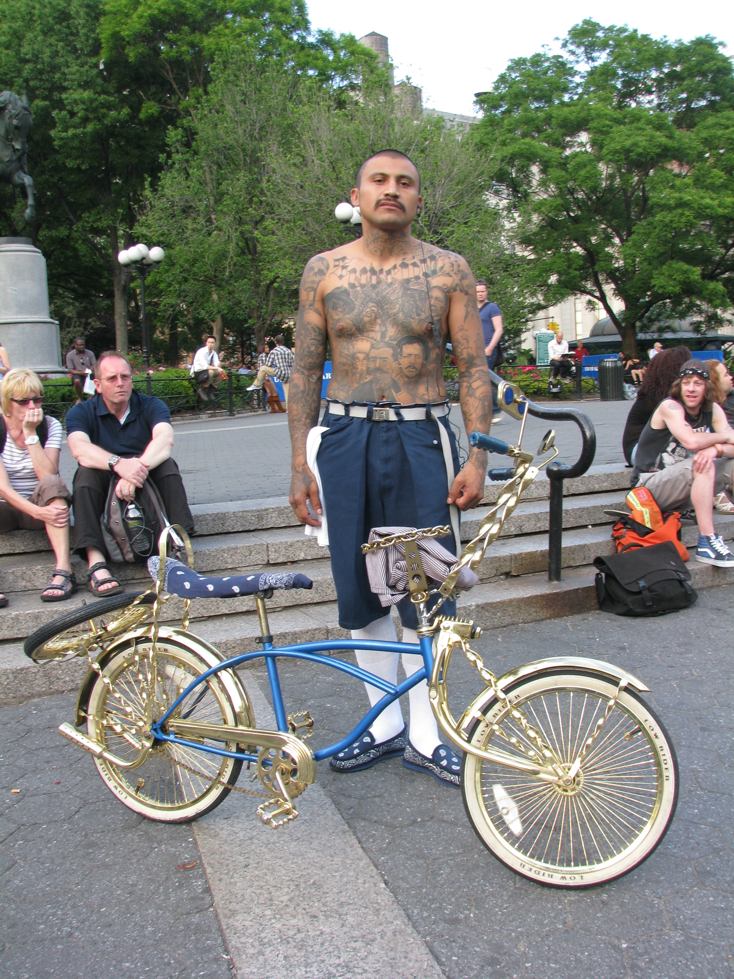 Cholo with lowrider bicycle