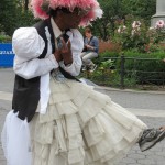 homeless fashion designer in pink feathered hat