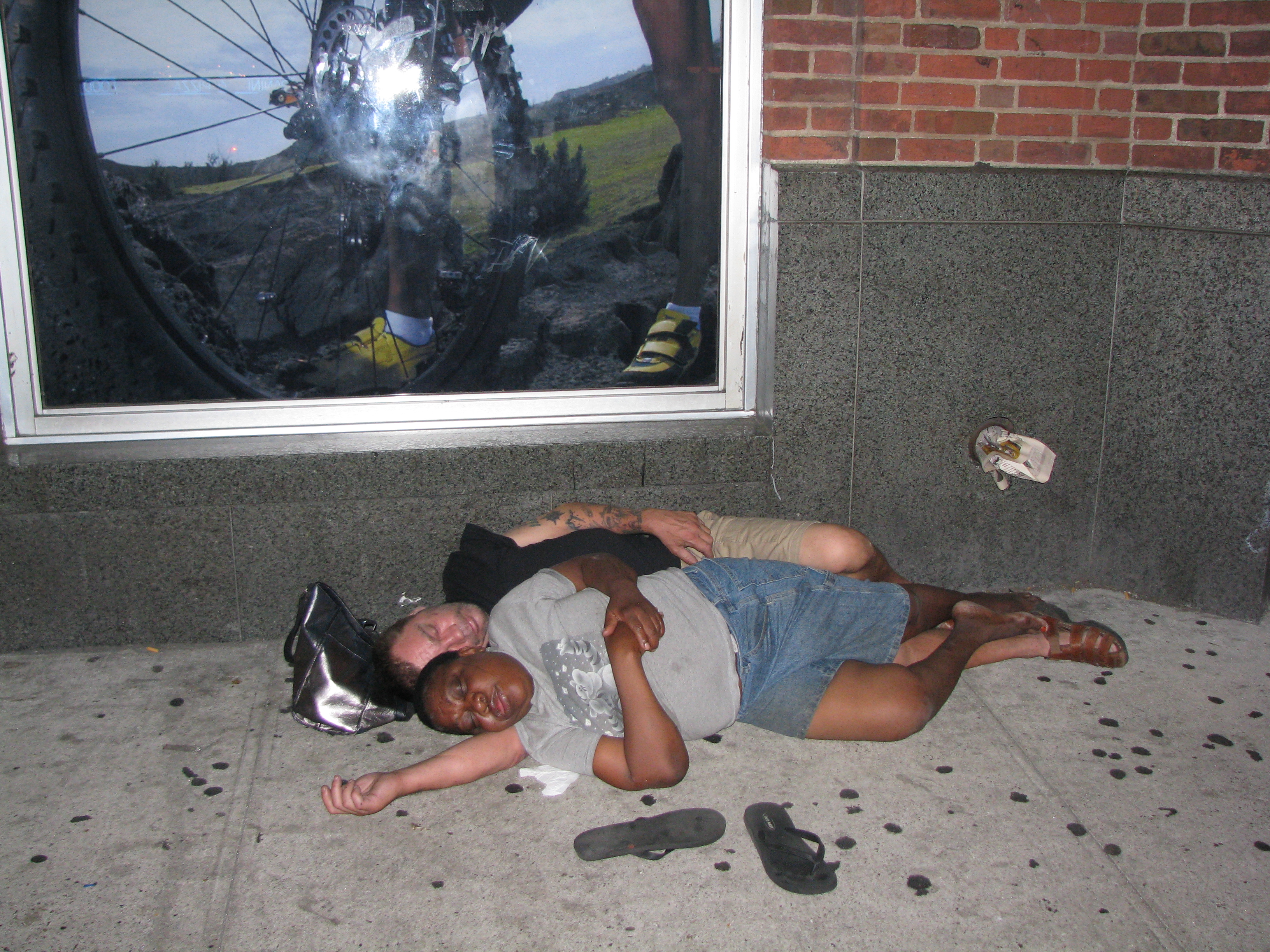 Homeless couple sleeping