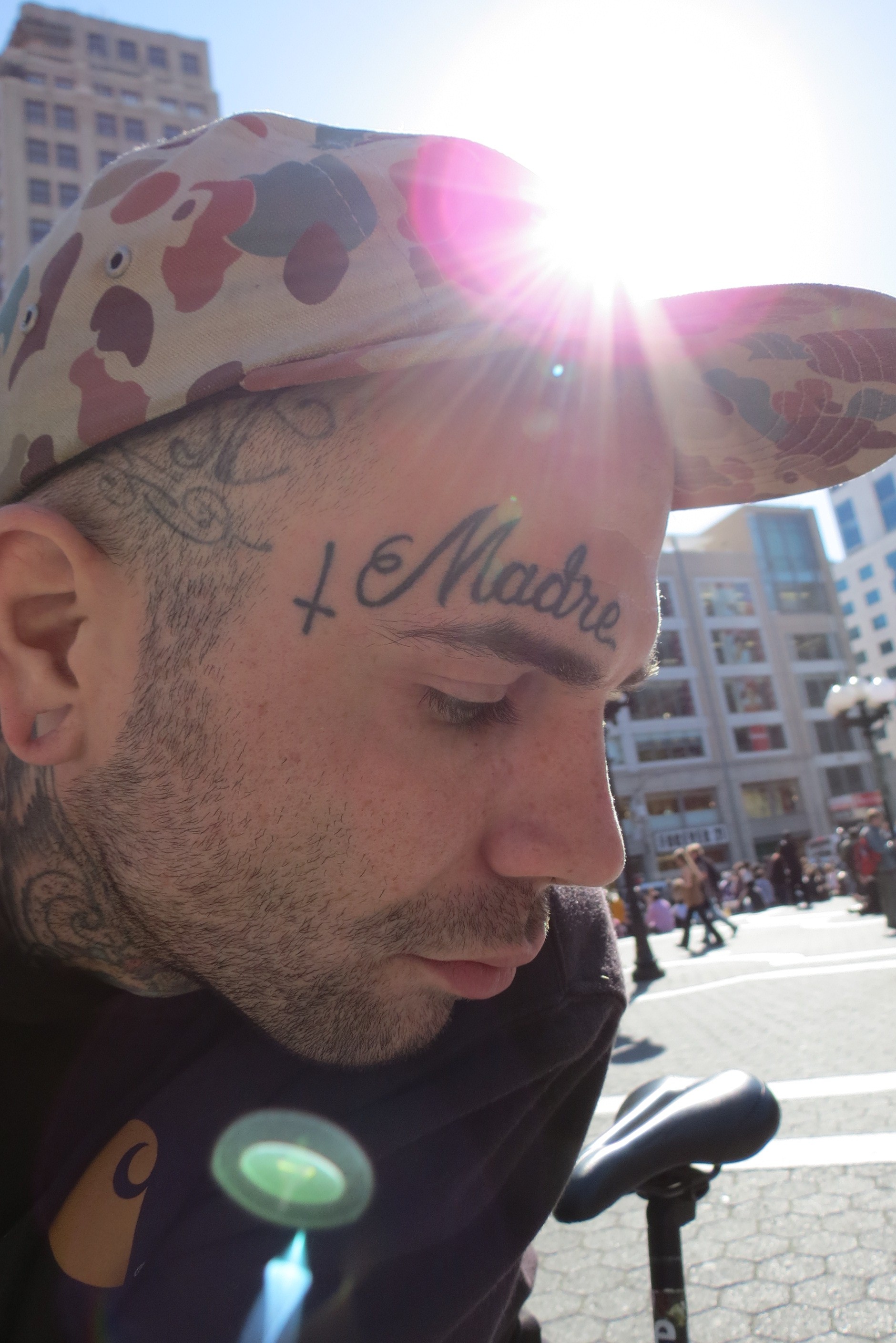 man with facial tattoos