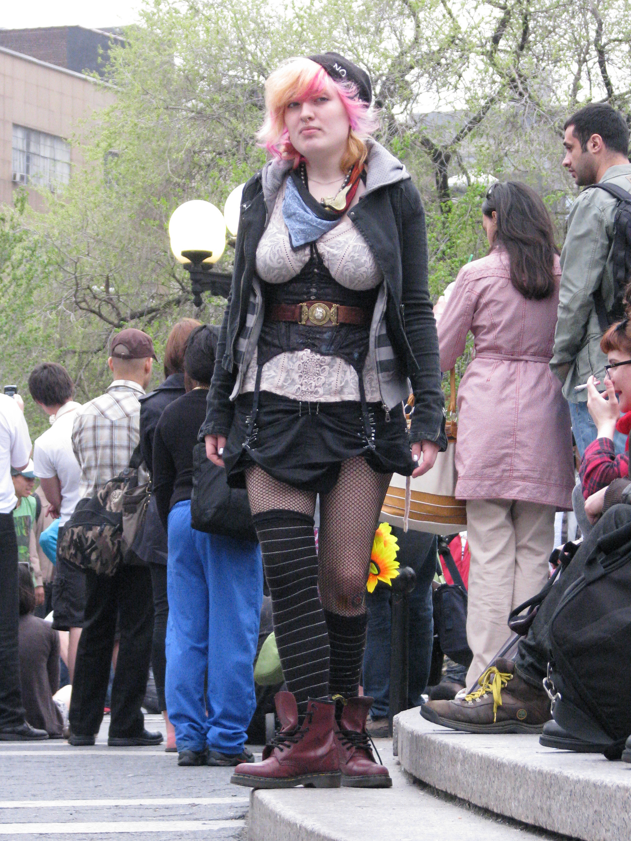 Girl wearing corset on top of her clothes