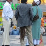 Man with very long dreads that go under his coat