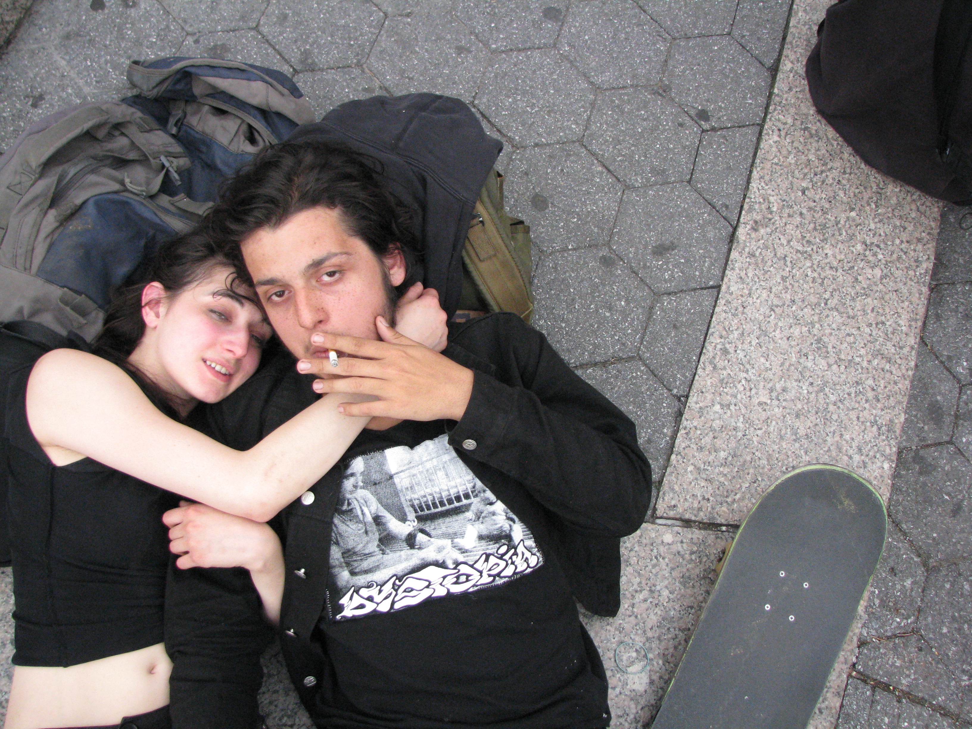 young couple lying down on steps