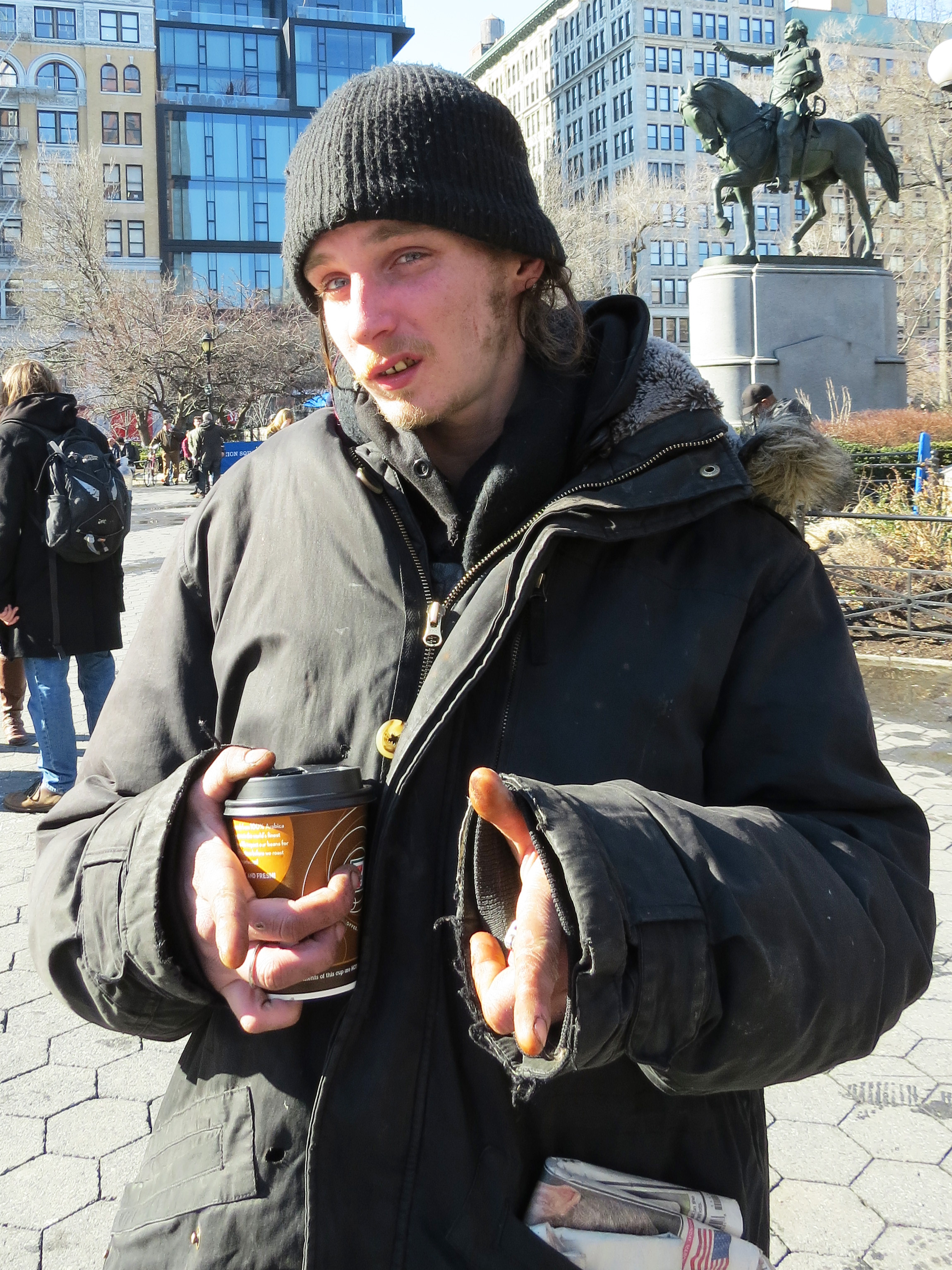 homeless junkie kid in winter coat
