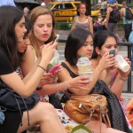 Girls drinking Starbucks on their Smartphones
