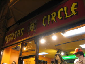 Medusa's Circle storefront sign