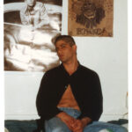 Mark after haircut 1988 Hollywood w/Iggy poster & Bonko drawn on a paper bag.