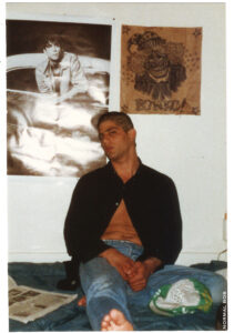 Mark after haircut 1988 Hollywood w/Iggy poster & Bonko drawn on a paper bag.